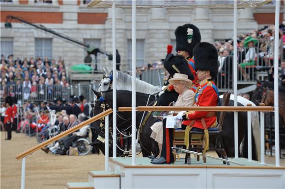 BRITAIN TROOPING THE COLOUR 