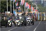 Military parade participants marching through Zagreb