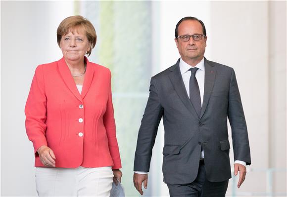 Merkel i Hollande za obvezujuće planove za razmještaj izbjeglica