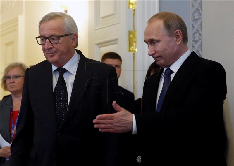 RUSSIA SPIEF PUTIN JUNCKER