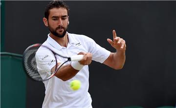 Wimbledon: Čilić u četvrtfinalu, Nishikori predao