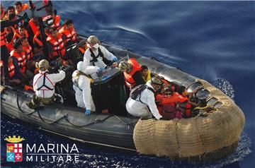 AT SEA MIGRATION REFUGEES RESCUED