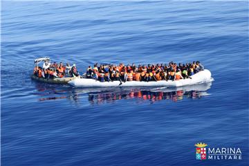 AT SEA MIGRATION REFUGEES RESCUED