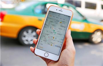 FILE CHINA UBER DIDI CHUXING MERGER