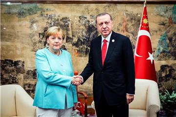 Merkel s Erdoganom - prvi susret nakon zahlađenja odnosa