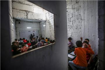 SYRIA CONFLICT AL-QABOON SCHOOL UNDERGROUND