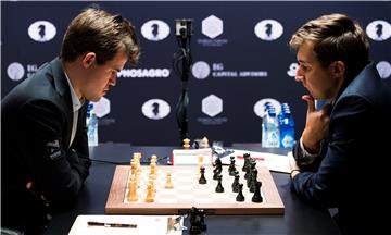 Šah: Carlsen i Karjakin remizirali u prvoj partiji