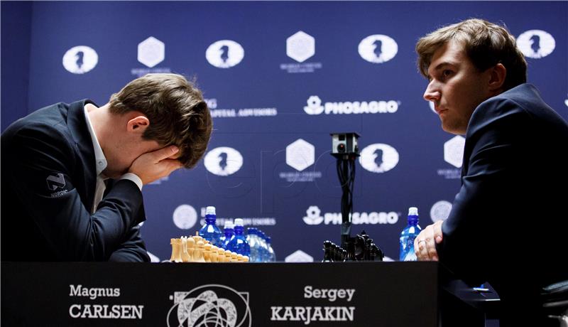 Šah: Carlsen - Karjakin 3-3