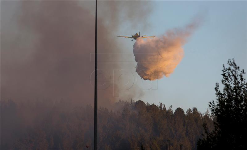 Two Croatian Canadair aircraft putting out fires in Israel