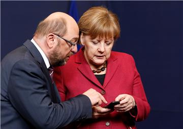 (FILE) BELGIUM GERMANY ELECTIONS MERKEL SCHULZ