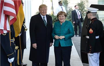 Trump i Merkel na prvom zajedničkom susretu