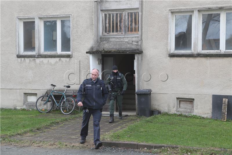 Police raid properties belonging to extremist group members