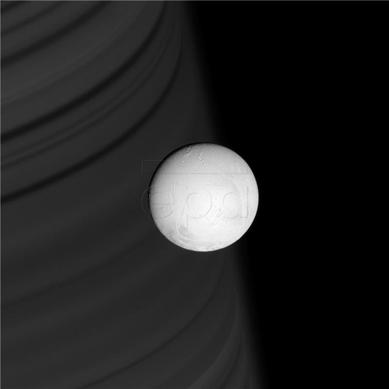 IN SPACE SATURN MOON ENCELADUS