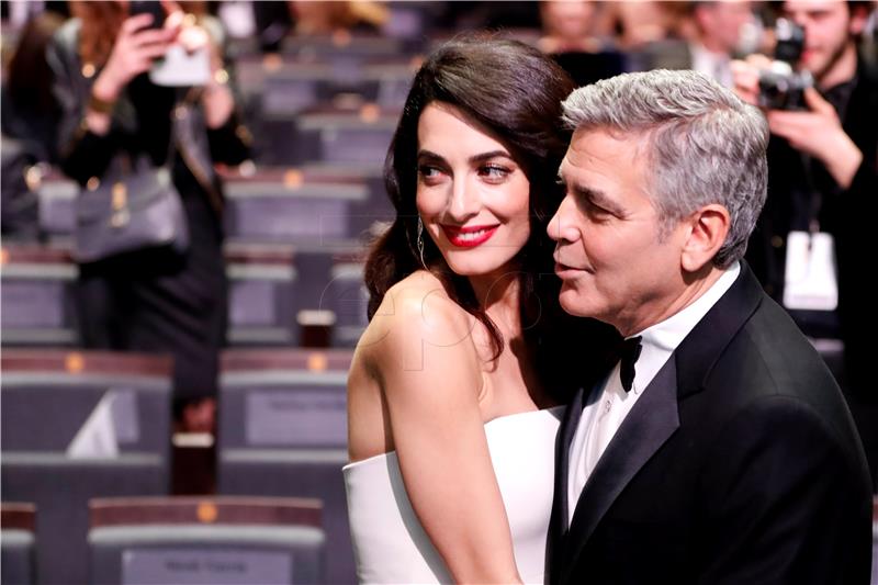 (FILE) FRANCE PEOPLE CLOONEY BABIES