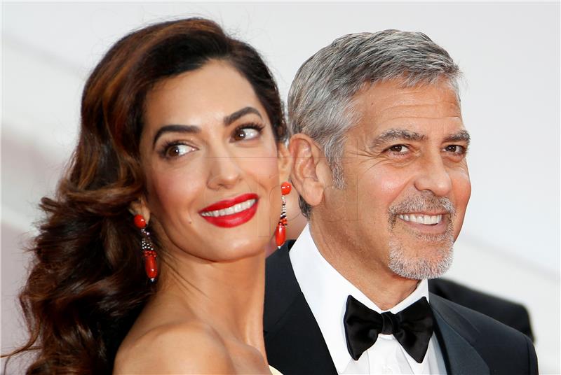 (FILE) FRANCE PEOPLE CLOONEY BABIES