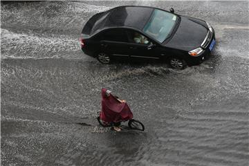 CHINA BEIJING WEATHER RAIN