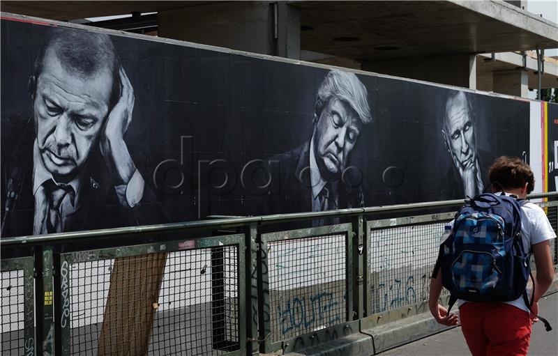 Sleeping politicians on posters ahead of G20 Summit