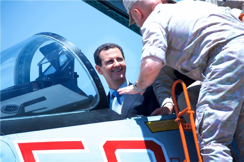 SYRIA PRESIDENT BASHAR ASSAD VISIT TO RUSSIAN MILITARY AIRBASE