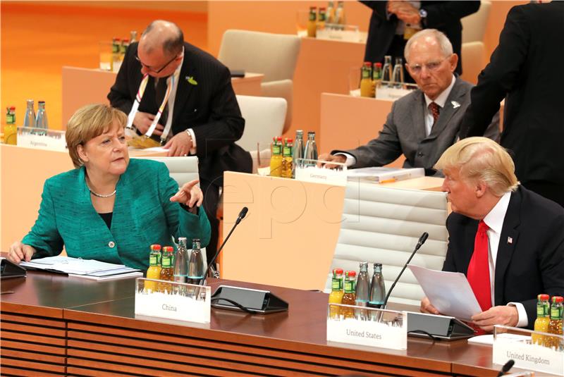 Merkel ističe da su razlike u odnosu na SAD oko klime jasno navedene