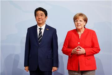 Abe i Merkel žele strože sankcije za Sjevernu Koreju