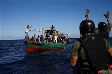 AT SEA ITALY MIGRANTS