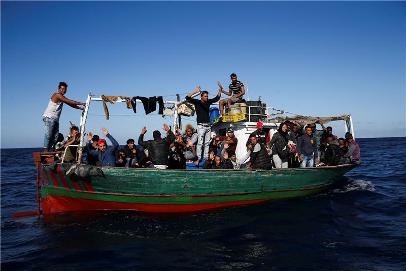 AT SEA ITALY MIGRANTS