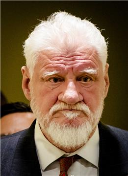 Praljak's act in courtroom - breaking news in world media