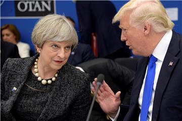 (FILE) BELGIUM USA BRITAIN TRUMP MAY TWEETS