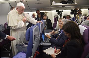 IN FLIGHT POPE FRANCIS VISIT