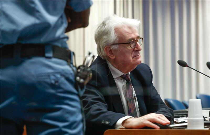 Karadzic says he didn't know about crimes, seeks acquittal