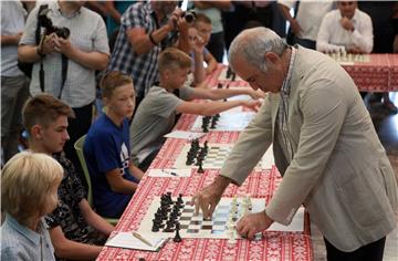 Kasparov against young players and known people