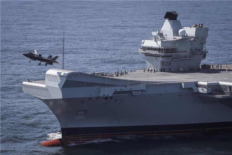 AT SEA BRITAIN USA DEFENCE F35 LANDS ON CARRIER