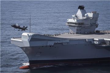 AT SEA BRITAIN USA DEFENCE F35 LANDS ON CARRIER