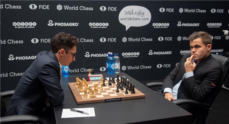 SP šah: Carlsen i Caruana remizirali u prvoj partiji