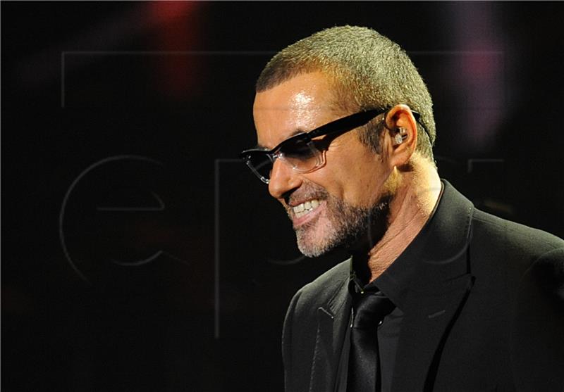 (FILE) BRITAIN MUSIC GEORGE MICHAEL AUCTION